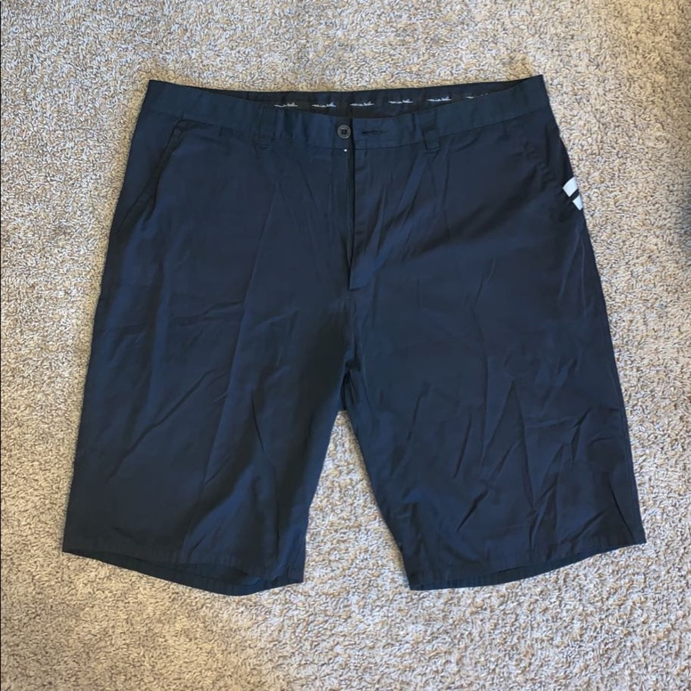 Men’s Travis Mathew golf shorts.